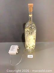 MaxSold Auction: Etched Floral Glass Wine Bottle Lamp with Warm White LED Lights - Ottawa (Ontario, Canada) SELLER MANAGED Downsizing Online Auction - Oaklawn Crescent