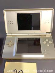 MaxSold Auction: Nintendo DS Lite (Gold) & Game Boy Advance SP (Purple) - Consoles Only - Ottawa (Ontario, Canada) SELLER MANAGED Downsizing Online Auction - Oaklawn Crescent
