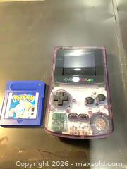 MaxSold Auction: Nintendo Game Boy Color - Atomic/Clear Purple - Ottawa (Ontario, Canada) SELLER MANAGED Downsizing Online Auction - Oaklawn Crescent
