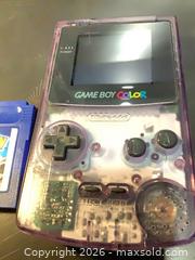 MaxSold Auction: Nintendo Game Boy Color - Atomic/Clear Purple - Ottawa (Ontario, Canada) SELLER MANAGED Downsizing Online Auction - Oaklawn Crescent