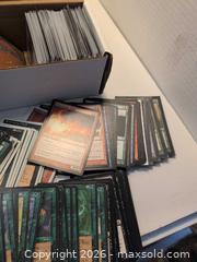 MaxSold Auction: Magic: The Gathering Loose Cards with Storage Long Box (Hundreds) - Victoria (British Columbia, Canada) SELLER MANAGED Reseller Online Auction - Island Highway (STORAGE)
