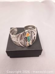 MaxSold Auction: Hand Made Sterling Silver Indigenous Art Cuff - Toronto (Ontario, Canada) SELLER MANAGED Estate Sale Online Auction - Swanwick Avenue