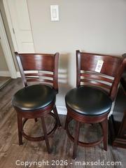MaxSold Auction: Set of 2 Wooden Swivel Bar Stools with Black Padded Seats - Centre Hastings (Ontario, Canada) PARTNER MANAGED Estate Sale Online Auction - Mckenzie Street