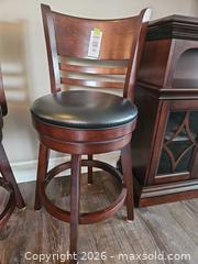 MaxSold Auction: Set of 2 Wooden Swivel Bar Stools with Black Padded Seats - Centre Hastings (Ontario, Canada) PARTNER MANAGED Estate Sale Online Auction - Mckenzie Street