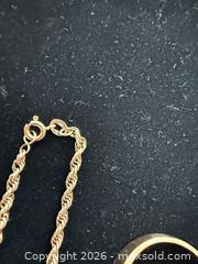 MaxSold Auction: 10k gold A - Vancouver (British Columbia, Canada) Estate Sale Online Auction - Balaclava Street