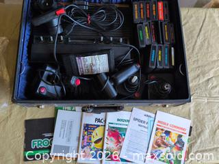 MaxSold Auction: Atari 2600 / Compatible VCS Console with Multiple Cartridges - Welland (Ontario, Canada) SELLER MANAGED Reseller Online Auction -  Young Road