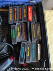 MaxSold Auction: Atari 2600 / Compatible VCS Console with Multiple Cartridges - Welland (Ontario, Canada) SELLER MANAGED Reseller Online Auction -  Young Road