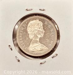 MaxSold Auction:  1968 Cdn. Queen Elizabeth II 50 Cents  - Newmarket (Ontario, Canada) PARTNER MANAGED Reseller Online Auction - Walter Avenue