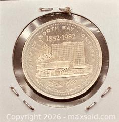 MaxSold Auction: 1980 Cdn. North Bay, Ontario Trade Dollar  - Newmarket (Ontario, Canada) PARTNER MANAGED Reseller Online Auction - Walter Avenue