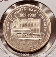 MaxSold Auction: 1982 Cdn. North Bay, Ontario Trade Dollar  - Newmarket (Ontario, Canada) PARTNER MANAGED Reseller Online Auction - Walter Avenue