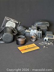 MaxSold Auction: Vintage 35mm photo camera set. - Aurora (Ontario, Canada) SELLER MANAGED Downsizing Online Auction - Zokol Drive