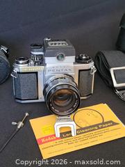 MaxSold Auction: Vintage 35mm photo camera set. - Aurora (Ontario, Canada) SELLER MANAGED Downsizing Online Auction - Zokol Drive