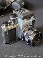 MaxSold Auction: Vintage 35mm photo camera set. - Aurora (Ontario, Canada) SELLER MANAGED Downsizing Online Auction - Zokol Drive