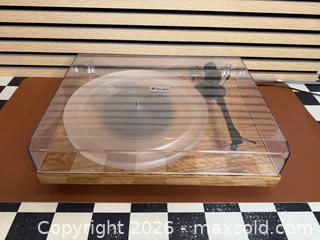 MaxSold Auction: Pro-Ject Xpression Carbon Classic Turntable w/ Grado Red & Acrylic Platter & Record Weight - Tested Working - Milton (Ontario, Canada) SELLER MANAGED Downsizing Online Auction - Broadway Avenue