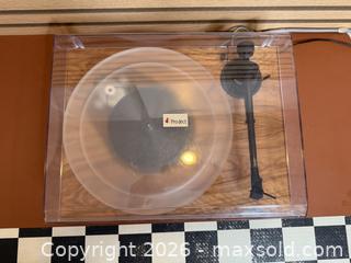 MaxSold Auction: Pro-Ject Xpression Carbon Classic Turntable w/ Grado Red & Acrylic Platter & Record Weight - Tested Working - Milton (Ontario, Canada) SELLER MANAGED Downsizing Online Auction - Broadway Avenue