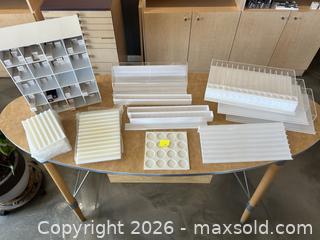 MaxSold Auction: Acrylic & White Plastic Retail Makeup Display Organizers 30 + ZERO product included. - Olds (Alberta, Canada) PARTNER MANAGED Commercial Liquidation Online Auction - 49 Avenue