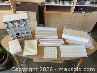 MaxSold Auction: Acrylic & White Plastic Retail Makeup Display Organizers 30 + ZERO product included. - Olds (Alberta, Canada) PARTNER MANAGED Commercial Liquidation Online Auction - 49 Avenue
