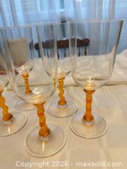 MaxSold Auction: Clear & Orange Plastic Dinnerware Set with Wine Glasses, 12-Piece - London (Ontario, Canada) PARTNER MANAGED Downsizing Online Auction - Reeves Avenue