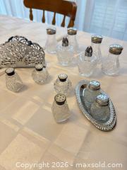 MaxSold Auction: Glass Salt & Pepper Shaker Assortment with Silver-Tone Napkin Holder - London (Ontario, Canada) PARTNER MANAGED Downsizing Online Auction - Reeves Avenue