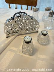 MaxSold Auction: Glass Salt & Pepper Shaker Assortment with Silver-Tone Napkin Holder - London (Ontario, Canada) PARTNER MANAGED Downsizing Online Auction - Reeves Avenue