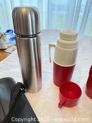 MaxSold Auction: Thermos, Travel Mugs and Insulated Cups with Carrying Case - London (Ontario, Canada) PARTNER MANAGED Downsizing Online Auction - Reeves Avenue