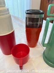 MaxSold Auction: Thermos, Travel Mugs and Insulated Cups with Carrying Case - London (Ontario, Canada) PARTNER MANAGED Downsizing Online Auction - Reeves Avenue