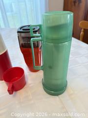 MaxSold Auction: Thermos, Travel Mugs and Insulated Cups with Carrying Case - London (Ontario, Canada) PARTNER MANAGED Downsizing Online Auction - Reeves Avenue