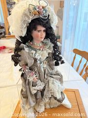 MaxSold Auction: Victorian-Style Porcelain Doll with Wooden Display Stand - London (Ontario, Canada) PARTNER MANAGED Downsizing Online Auction - Reeves Avenue