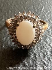 MaxSold Auction: 10K Gold Ring With Center Oval White Stone and Diamond-Like Accents - Hamilton (Ontario, Canada) SELLER MANAGED Downsizing Online Auction -  Sherman Avenue South