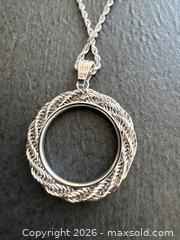MaxSold Auction: 10K White Gold Pendant and Chain, 20 Inches Long - Hamilton (Ontario, Canada) SELLER MANAGED Downsizing Online Auction -  Sherman Avenue South