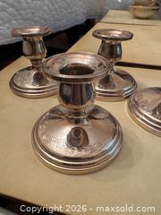 MaxSold Auction: Four Birks Sterling Silver Candle Holders with Floral Engraving - Hamilton (Ontario, Canada) SELLER MANAGED Downsizing Online Auction -  Sherman Avenue South