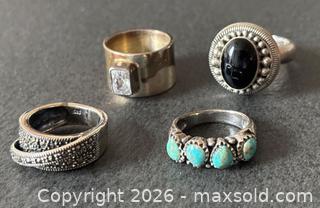 MaxSold Auction: Four Sterling Silver Rings with Various Designs - Hamilton (Ontario, Canada) SELLER MANAGED Downsizing Online Auction -  Sherman Avenue South