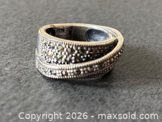 MaxSold Auction: Four Sterling Silver Rings with Various Designs - Hamilton (Ontario, Canada) SELLER MANAGED Downsizing Online Auction -  Sherman Avenue South