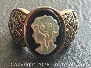 MaxSold Auction: Four Sterling Silver Rings with Various Stones and Designs - Hamilton (Ontario, Canada) SELLER MANAGED Downsizing Online Auction -  Sherman Avenue South
