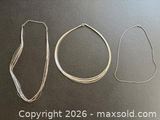 MaxSold Auction: Three .925 Sterling Silver Necklaces with Various Designs - Hamilton (Ontario, Canada) SELLER MANAGED Downsizing Online Auction -  Sherman Avenue South
