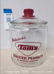 MaxSold Auction: Vintage Glass Tom's Toasted Peanuts Counter Display Jar. B - Lakeland (Florida, USA) SELLER MANAGED Moving Online Auction - Highway 33 (STORAGE)