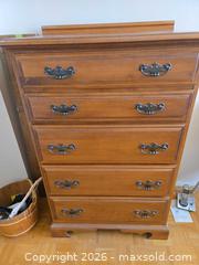 MaxSold Auction: 5-Drawer Medium Brown Oak Tone Dresser with Metal Handles - Calgary (Alberta, Canada) PARTNER MANAGED Downsizing Online Auction - Cedar Crescent Southwest (CONDO)