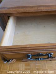 MaxSold Auction: 5-Drawer Medium Brown Oak Tone Dresser with Metal Handles - Calgary (Alberta, Canada) PARTNER MANAGED Downsizing Online Auction - Cedar Crescent Southwest (CONDO)