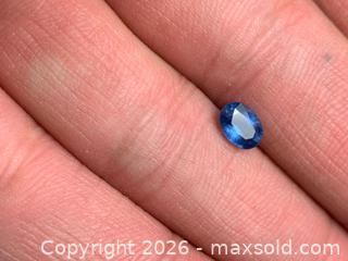 MaxSold Auction: (0.63ct)  Natural blue oval sapphire - Toronto (Ontario, Canada) PARTNER MANAGED Downsizing Online Auction - Queen Street East