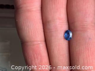 MaxSold Auction: (0.63ct)  Natural blue oval sapphire - Toronto (Ontario, Canada) PARTNER MANAGED Downsizing Online Auction - Queen Street East