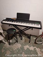 MaxSold Auction: Korg QS-1 88-Key Digital Piano / Keyboard with Stand and Stool B - Ottawa (Ontario, Canada) Moving Online Auction - Waverley Street