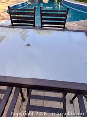 MaxSold Auction: Brian Gluckstein Home 7-Piece Outdoor Patio Dining Set - Table & 6 Chairs - Oakville (Ontario, Canada) SELLER MANAGED Downsizing Online Auction - Willowridge Court