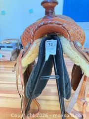 MaxSold Auction: 12" Western Saddle with Saddle Pad, Chaps, Stirrups - North Saanich (British Columbia, Canada) PARTNER MANAGED Estate Sale Online Auction - Woodcreek Drive