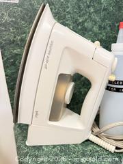 MaxSold Auction: Lot: Braun, T?Fal & Black & Decker Irons with Ironing Board - North Saanich (British Columbia, Canada) PARTNER MANAGED Estate Sale Online Auction - Woodcreek Drive