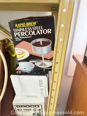 MaxSold Auction: Mixed Household Lot: Percolator, Lantern, Wooden Swing, Ropes Includes Metal Storage Shelf. - North Saanich (British Columbia, Canada) PARTNER MANAGED Estate Sale Online Auction - Woodcreek Drive