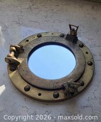 MaxSold Auction: Vintage Brass Ship Porthole with Mirror Glass - Size: 7.5" - Kingston (Ontario, Canada) SELLER MANAGED Downsizing Online Auction - Abdo Road