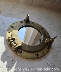 MaxSold Auction: Vintage Brass Ship Porthole with Mirror Glass - Size: 7.5" - Kingston (Ontario, Canada) SELLER MANAGED Downsizing Online Auction - Abdo Road