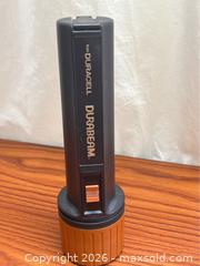 MaxSold Auction: Vintage Black and Orange Duracell Durabeam Flashlight (shipping available) - Campbell (California, USA) SELLER MANAGED Downsizing Online Auction - Dell Avenue 