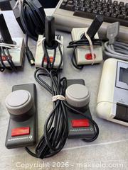 MaxSold Auction: A BIG LOT OF COMMODORE 64 ITEMS. KEYBOARD, DISC DRIVE + MUCH MORE. - Hamilton (Ontario, Canada) SELLER MANAGED Downsizing Online Auction - St. Clair Avenue