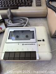 MaxSold Auction: A BIG LOT OF COMMODORE 64 ITEMS. KEYBOARD, DISC DRIVE + MUCH MORE. - Hamilton (Ontario, Canada) SELLER MANAGED Downsizing Online Auction - St. Clair Avenue